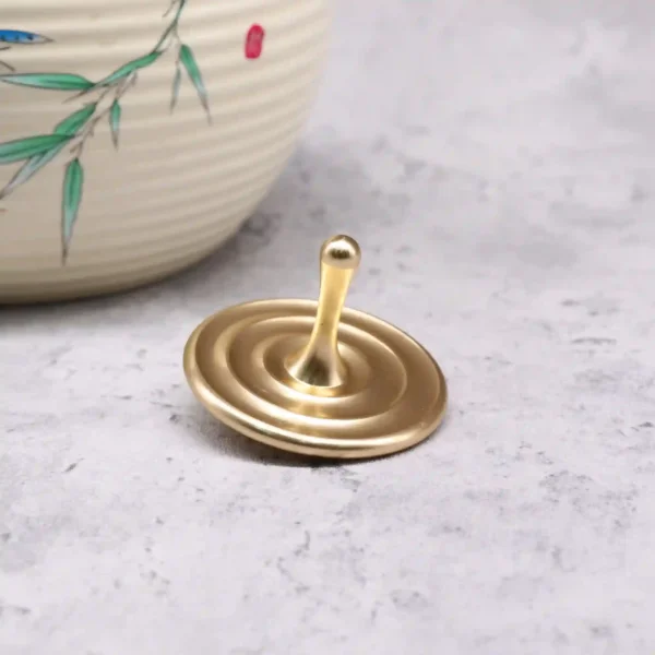 Water Droplet Spinning Top