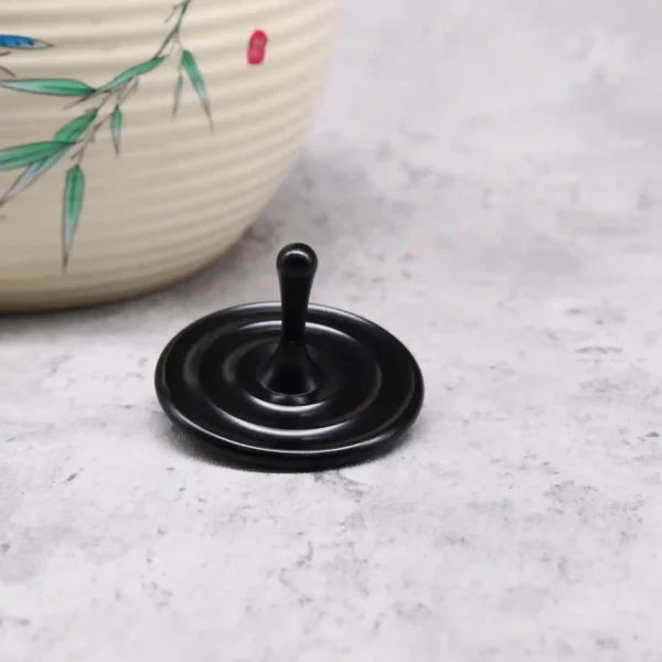 Water Droplet Spinning Top